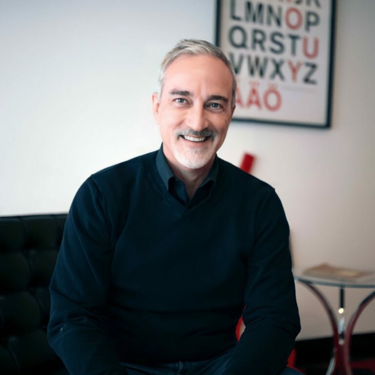 David Layton sits near the entrance to the Datachieve Digital office