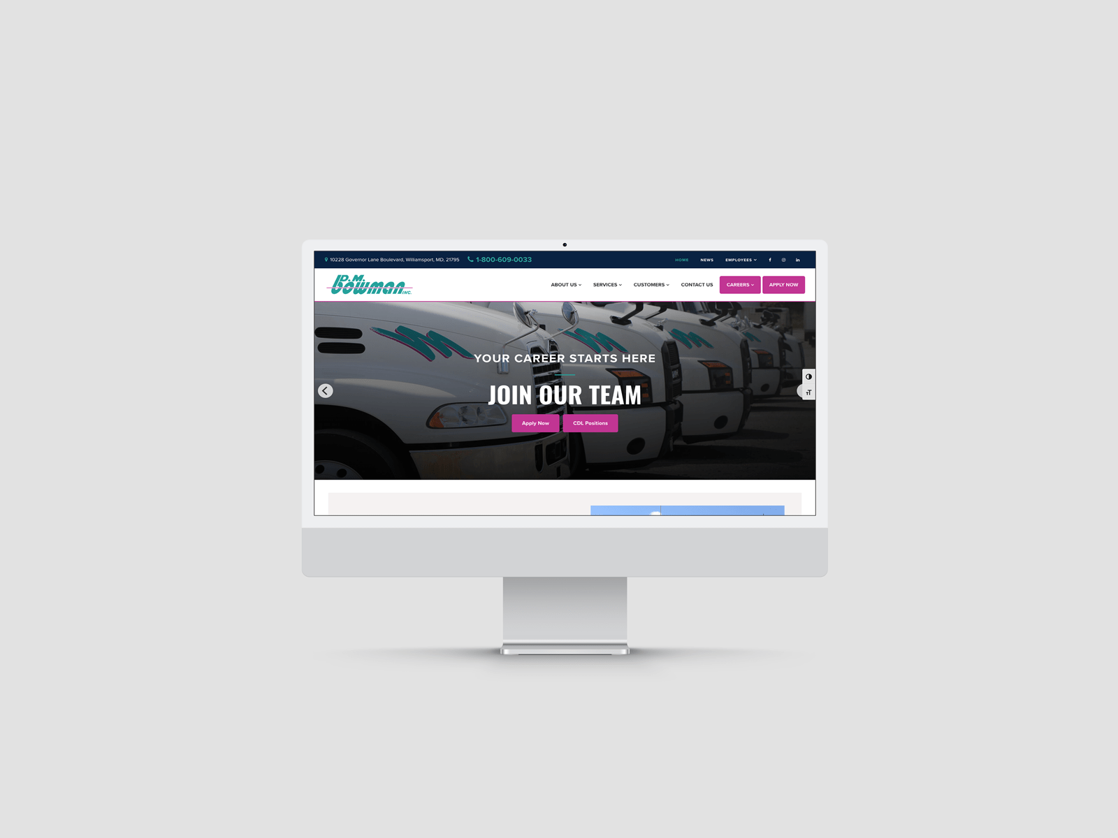 The new D.M. Bowman website transposed onto the screen of an iMac